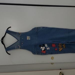 Disney adult denim overall featuring Mickey Mouse